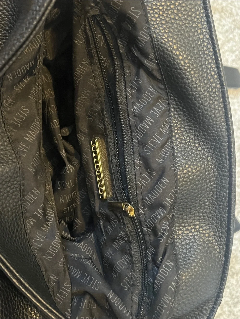 Steve Madden Black Pebbled Leather Backpack with Gold Accents